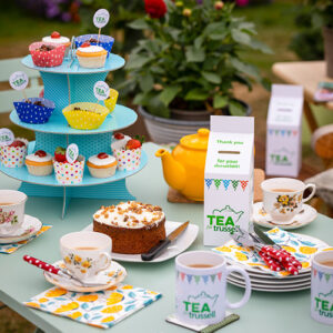 Tea and cake on a table at a Tea for Trussell event